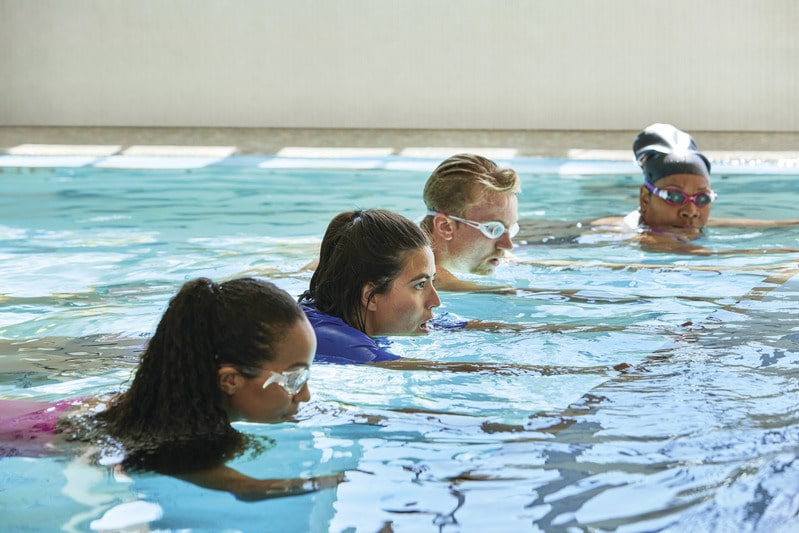 adults learn how to swim at the ymca
