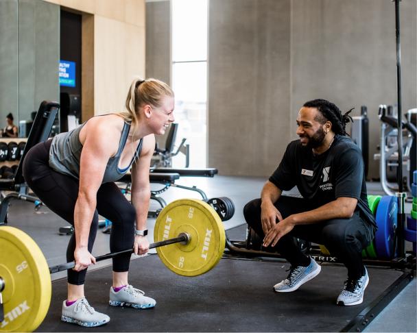 women with barbell